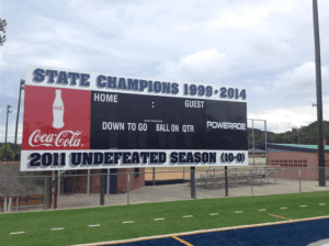 The Cougar Stadium scoreboard, honoring Clay-Chalkville’s two state championship teams. photo via Clay-Chalkville football’s Twitter page  