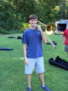 Stewart Brockman with his trombone after it was returned unharmed. Submitted photo