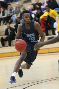Marcus Baldwin drives during a game for the Iowa Central Tritons. Photo courtesy ICCC.
