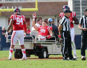John Youngblood was carted off the field after dislocating his ankle in the Ole Miss win over Georgia Southern. Photo via Twitter @OleMissPix