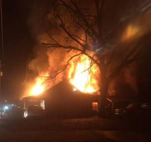 A photo of the home as it was burning. Submitted photo