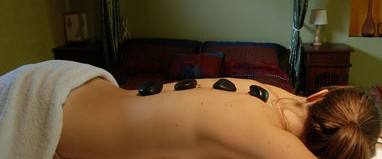 Want to win a free hot stone massage from Fisher Chiropractic?