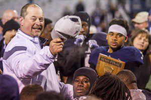Clay-Chalkville head coach Jerry Hood and players celebrate after the win over Florence. photo by Ron Burkett