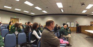 UAB supporters listen as Trussville resident Justin Rodgers, far right, speaks about the UAB situation. photo by Gary Lloyd