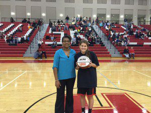 Cayla Dillard with the 1,000 points ball and Hewitt-Trussville head coach Tonya Hunter photo courtesy of Hewitt-Trussville Athletics