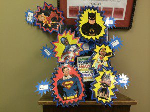 The Trussville City Board of Education members, depicted as superheroes  photo by Gary Lloyd
