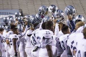 Clay-Chalkville players raise their helmets during the Class 6A state championship game in Auburn on Dec. 5, 2014. The Cougars defeated Saraland 36-31 for the state title. file photo by Ron Burkett