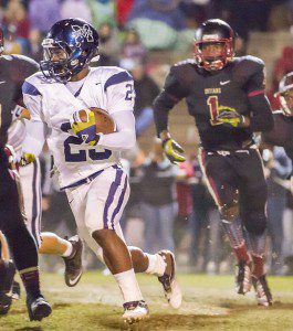 Pinson Valley linebacker Nathan Cunningham (1) chases a Moody running back during the 2013 season. file photo by Ron Burkett