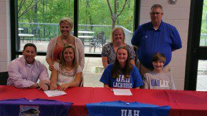 Kally Bradford, left, and Alex White, right, signed their national letters of intent to play college lacrosse last week. submitted photo