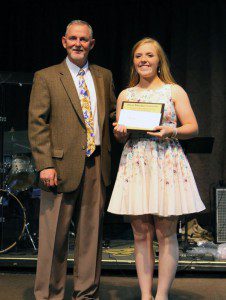 Kirbi Tuck receives Student of the Year honors from Joe Cochran, executive director of the Pinson Education Foundation. submitted photo