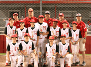 Trussville’s U12 team holding its championship trophy. submitted photo