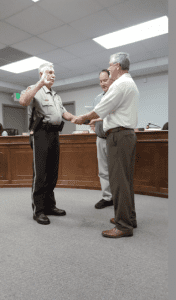 Deputy Doyle Burns being sworn into the Pinson Sheriff's Department. photo by Lee Weyhrich