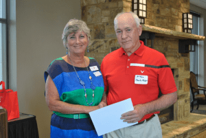 TACC Board President, Melissa Jones, and A+ Auto and Tire Repair representative, Charlie Philpot, at the chamber’s July luncheon. submitted photo  