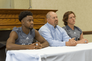 Clay-Chalkville wide receiver T.J. Simmons, head coach Jerry Hood and defensive end Cole Baker at the Jefferson-Shelby high school football media days. Photo by Ron Burkett 