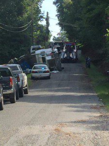 A tractor trailer has overturned on Mobile Ave.