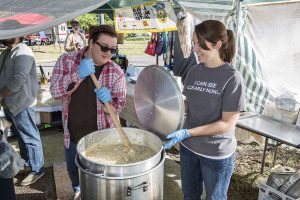 Vendors stir a pot of beans at the Alabama Butterbean Festival last year. Photo by Ron Burkett