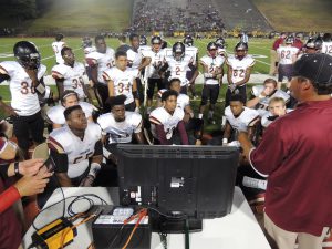 Pinson Valley offensive coordinator Jon Clements addresses the Indians at Lawson Field last week. Photo by Kristi Slawson 