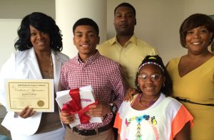 Jaylen Callins with Board President and Family cropped