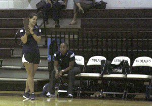 Clay-Chalkville volleyball coaches Jennifer Hughes (standing) and Natasha Brown (seated) during a game earlier this year.
