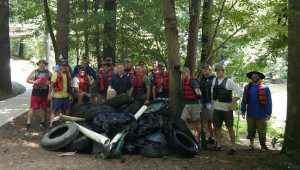 Volunteers from Regions Bank show off the trash they were able to recover from thee first mile of their Cahaba River clean up day last week. Submitted photo
