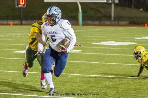Clay-Chalkville running back A.J. Walker rushes the ball against Woodlawn last week. photo by Ron Burkett