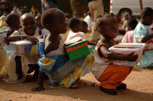 Children in Uganda receive their gifts from Operation Christmas Child. Photo courtesy of Samaritan's Purse