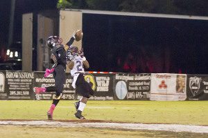 Pinson Valley cornerback Jay Woods breaking up one of his nine passes in 2015 against Shades Valley. photo by Ron Burkett 