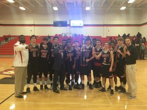 The Hewitt-Trussville basketball team after winning the Albertville Shootout on Wednesday. submitted photo