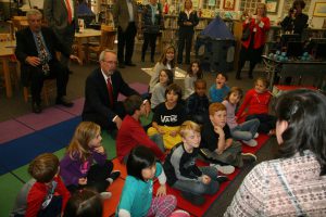 State Supt. Dr. Tommy BIce sits with Paine Elementary second graders. Photo by Chris Yow