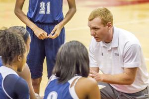 Clay-Chalkville head coach Justin Haynie talking to his team at the New Year's Shootout. photo by Ron Burkett 