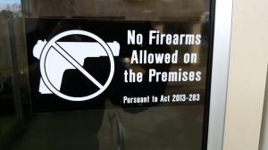 A sign at Trussville City Hall prohibits firearms on premises. Photo by Scott Buttram