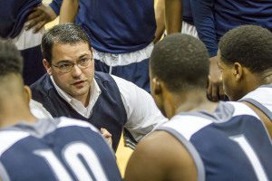 Clay-Chalkville head coach Jeremy Monceaux talks with his team. Photo by Ron Burkett 