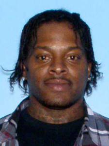 Monique Antoine Roscoe wanted on charges of robbery, kidnapping and murder. Photo via Crimestoppers of Metro Alabama.
