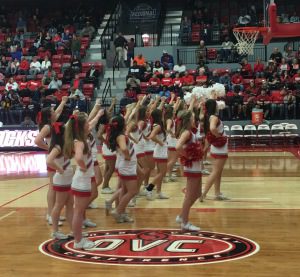 The Huskies cheerleaders try to rally the fans at Jacksonville. (photo by David Knox)