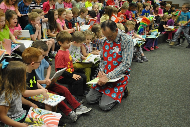 Young readers read with Rotarians