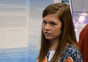 Abigail Knight, a student at Hewitt-Trussville High School, discusses her research project with judges during the Alabama Science and Engineering Fair at The University of Alabama in Huntsville on Friday, April 1. In addition to finishing second in the senior division's environmental engineering category, Knight won sponsored awards from Boeing, TVA, the Alabama Geological Society and the U.S. Navy/Marine Corps Naval Research Laboratory. Photo by Phil Gentry/UAH