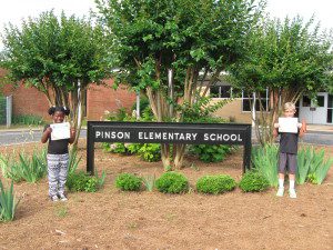 Jayla Feagins (L) was honored for perfect attendance at Pinson Elementary.  Parker Whisenant (R) hasn't missed a day of school in three years.