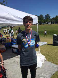 Benjamin Knox took home two golds and two state records, plus a bronze. Photo Trussville Athletics.