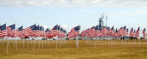 American flags wave at the U.S.S. Alabama Battleship Memorial Park in Mobile. (Alabama News Center) 
