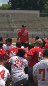 Former Hewitt-Trussville standout John Youngblood talks to the Huskies after a practice last week. Youngblood, who now plays for Ole Miss, was named the 27th recipient of the Chucky Mullins Courage Award and will wear Mullins’ No. 38 jersey in 2016. Youngblood graduated from Ole Miss in December of 2015. Photo courtesy Hewitt-Trussville athletics. 