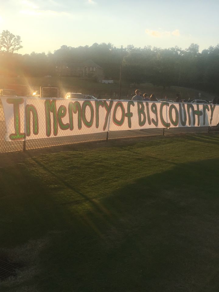 CCHS cheerleaders honor 'Big Country' with banner at football game 