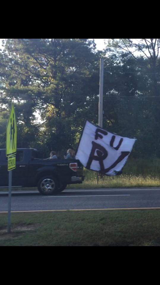CCHS students fly profane flag behind truck Friday morning