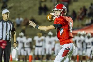 Connor Adair threw 4 touchdown passes to send the Huskies to 9-0. Phot by Ron Burkett/The Trussville Tribune