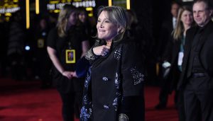 Carrie Fisher arrives at the world premiere of "Star Wars: The Force Awakens" at the TCL Chinese Theatre on Monday, Dec. 14, 2015, in Los Angeles. (Photo by Jordan Strauss/Invision/AP)