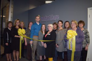 Representatives from Comfort Care and TACC during their ribbon cutting. Photo courtesy of TACC