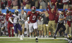 Alabama Crimson Tide running back Bo Scarbrough (9) runs the ball for a touchdown against the Washington Huskies during the fourth quarter in the 2016 CFP semifinal at the Peach Bowl at the Georgia Dome. Photo by Dale Zanine-USA TODAY Sports