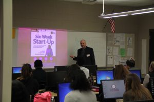 Amerex Executive Vice President Vic Modic speaks to an HTHS class. Photo by Chris Yow
