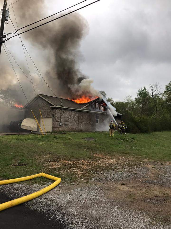 Center Point FD fighting fully-involved structure fire