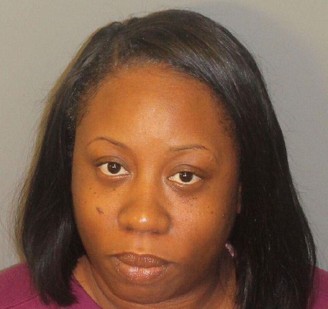Woodstock woman charged with child abuse after driving with son on trunk