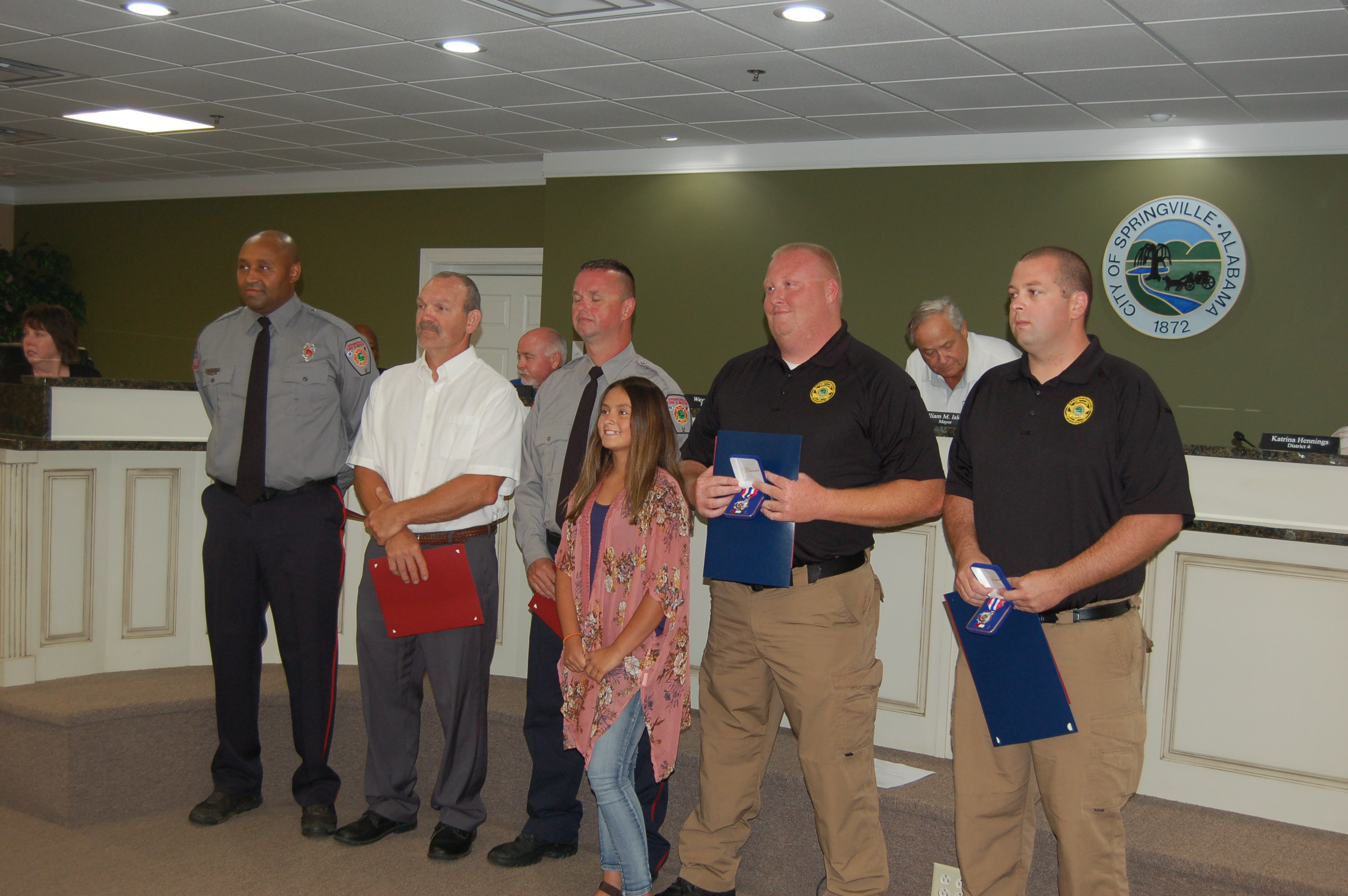Police, firefighters who saved girl in May commended at Springville Council meeting